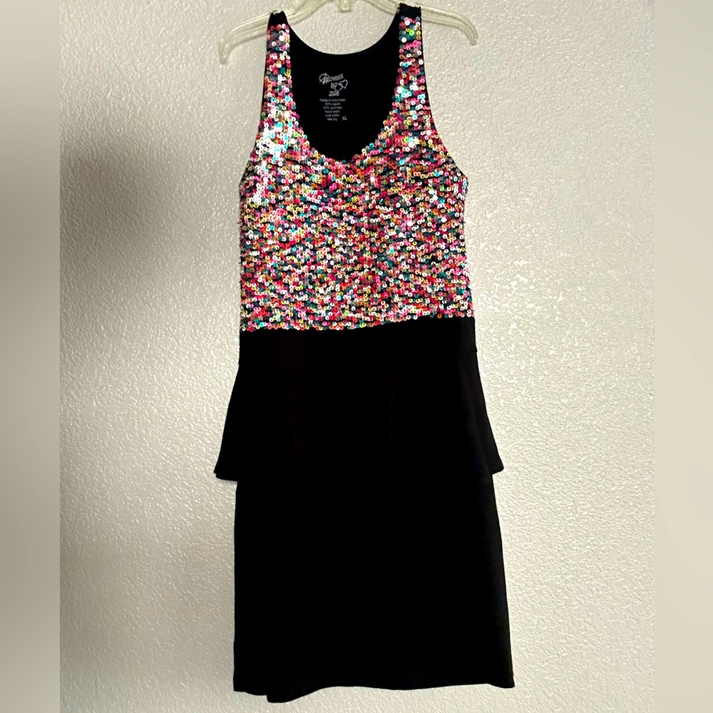 Flowers by Zoe black with multi colored sequins  does have stretch  Sz  XL girls